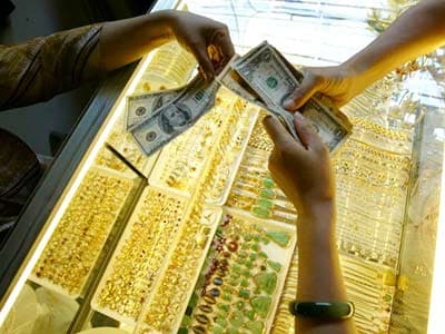 Giá vàng và giá USD giảm mạnh